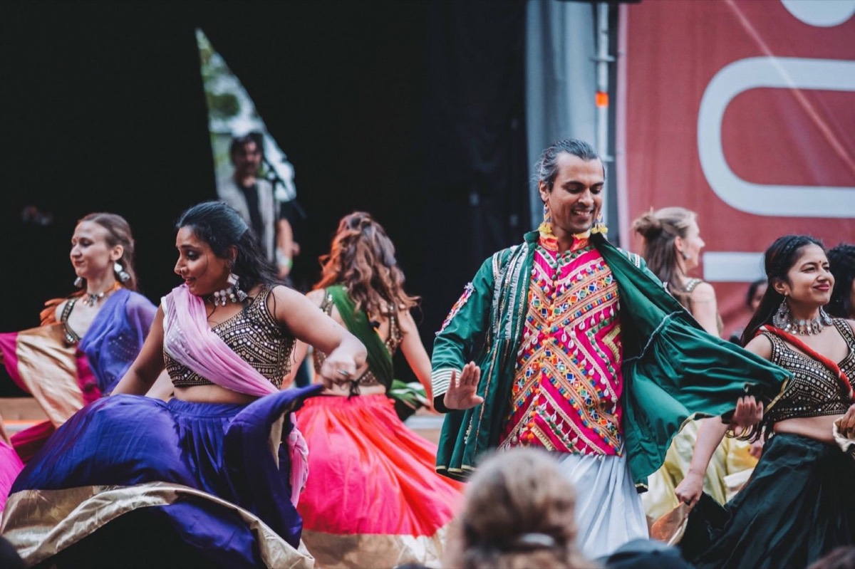 ABC company dancers performing live on an outdoor stage