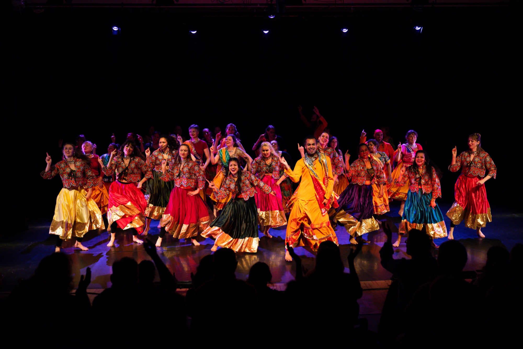 ABC ensemble filling a theatre stage with Indian dance at the GIDF Gala finale