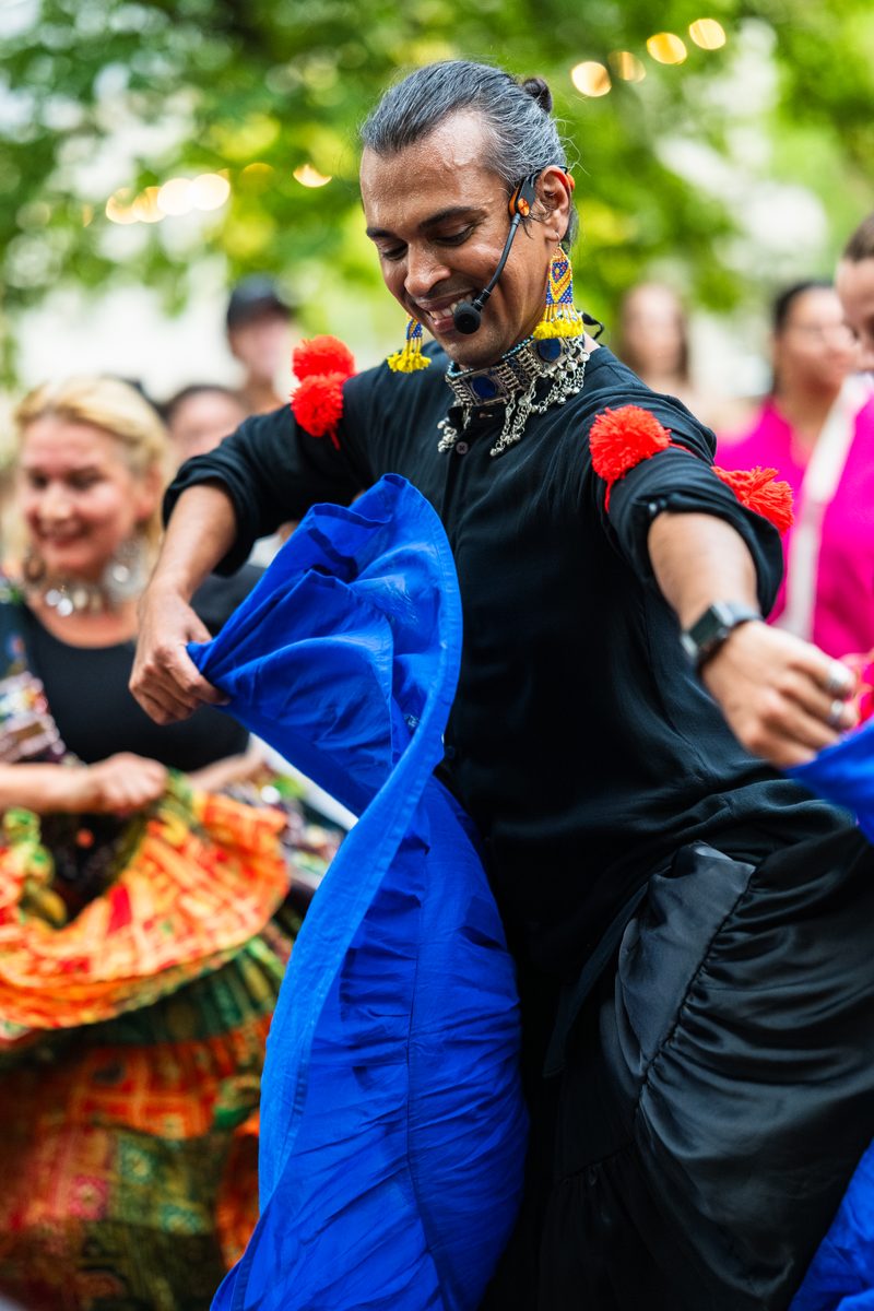 ABC founder and artistic director Swapnil Dagliya swirling a cobalt Kalbeliya skirt