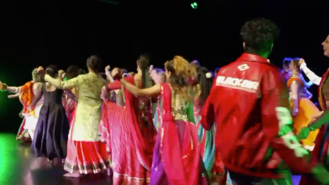 The full cast on stage at the curtain call